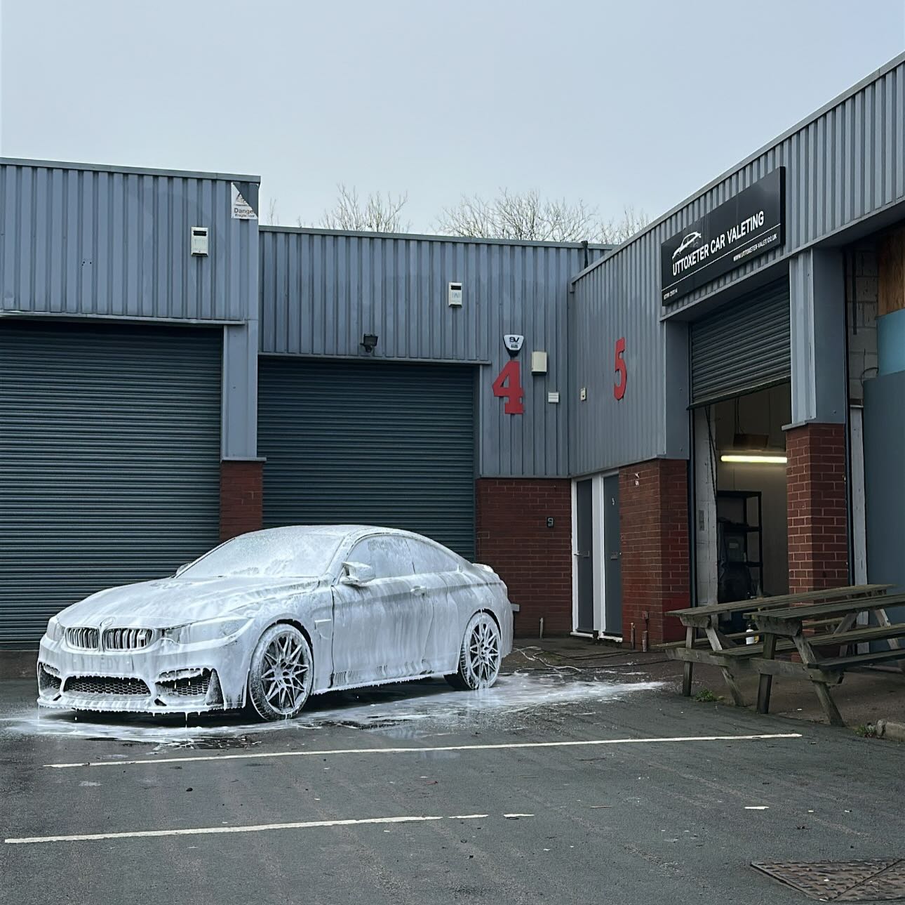 Snow-foamed BMW parked outside our Uttoxeter Car Valeting unit